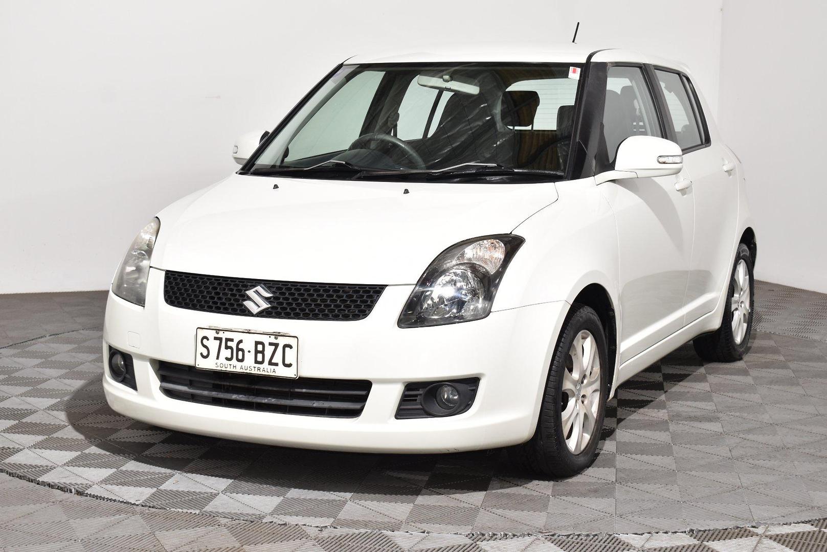 2010 Suzuki Swift RE4 — photo 12